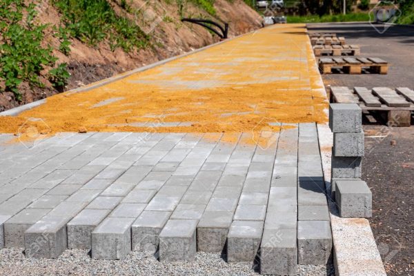 Paving work in road construction Construction site